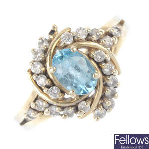 A 14ct gold zircon and diamond cluster ring.