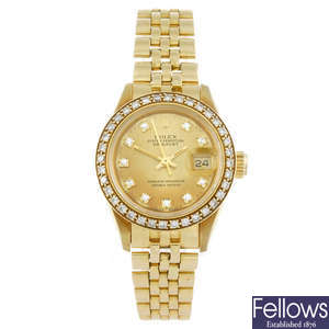 ROLEX - a lady's 18ct yellow gold Oyster Perpetual Datejust bracelet watch.