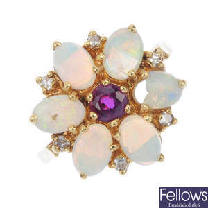 An 18ct gold ruby and opal cluster ring.