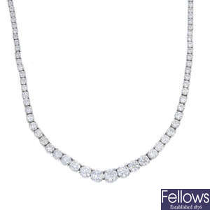 A diamond riviere necklace.