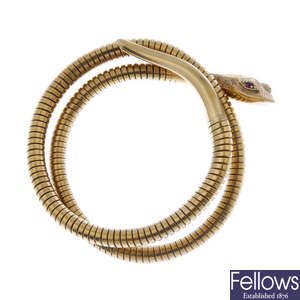 A 1970s 9ct gold snake bangle.