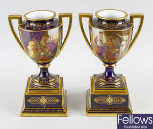 A pair of Vienna porcelain twin handled vases. 