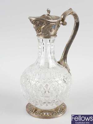 A good quality silver-plated glass claret jug. 