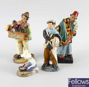 A group of four Royal Doulton figures. 