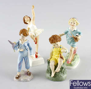 A group of four Royal Worcester figures. 