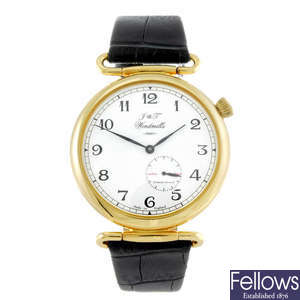 J & T WINDMILLS - a gentleman's 18ct yellow gold wrist watch.