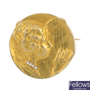 A French Art Nouveau 18ct gold medallist brooch.