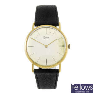 RUSER - a gentleman's yellow metal wrist watch.