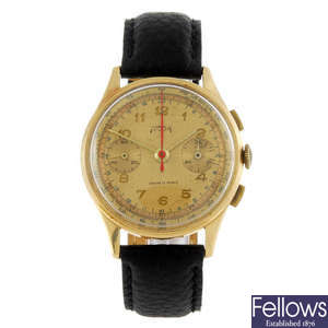 TELDA - a gentleman's yellow metal chronograph wrist watch.