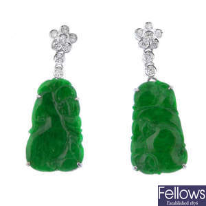 A pair of jade and diamond ear pendants.