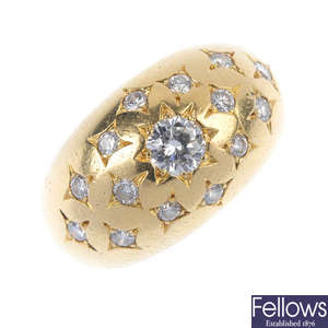 A yellow gold diamond bombe ring.