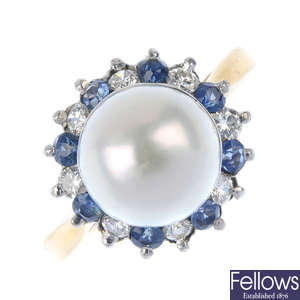 A cultured pearl, diamond and sapphire cluster ring. 
