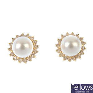 A pair of 18ct gold cultured pearl and diamond cluster ear studs.