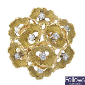 A 1970s 18ct gold diamond stylised flower ring. 