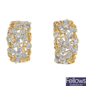 A pair of bi-colour diamond earrings.