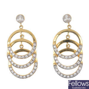 A pair of 18ct gold diamond ear pendants. 