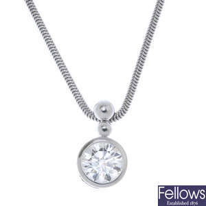 BOODLES & DUNTHORNE - a platinum diamond single-stone pendant.