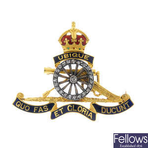 An early 20th century gold diamond and enamel 'Royal Canadian Artillery' regimental brooch.
