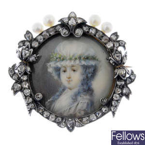 An early 20th century cultured pearl and diamond portrait brooch. 
