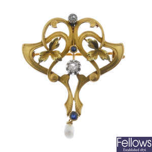 A French Art Nouveau 18ct gold and gem-set pendant.