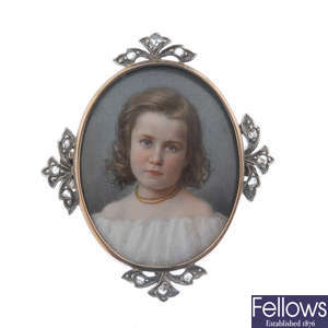 An early 20th century silver and 18ct gold miniature portrait diamond brooch. 