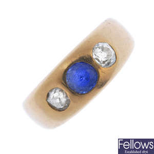 A late 19th century 18ct gold synthetic sapphire and diamond band ring.