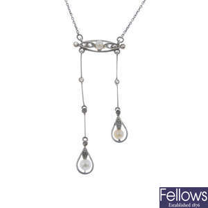 An early 20th century platinum and gold seed pearl and diamond negligee pendant