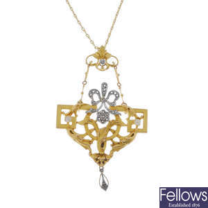 A French diamond pendant with chain.