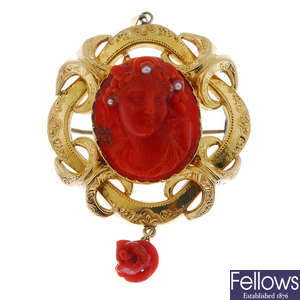 A late 19th century gold continental coral and seed pearl brooch. 