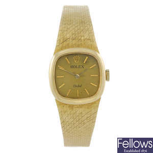 ROLEX - a lady's yellow metal Orchid bracelet watch.