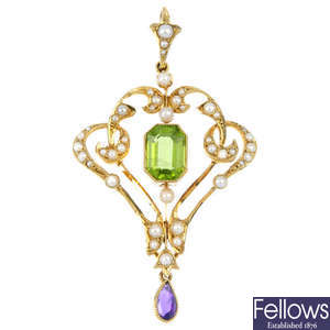 An early 20th century 15ct gold peridot, split pearl and amethyst pendant. 