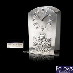 A Liberty & Co silver Cymric mantel clock.