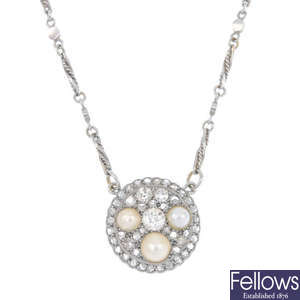 A diamond and split pearl pendant. 