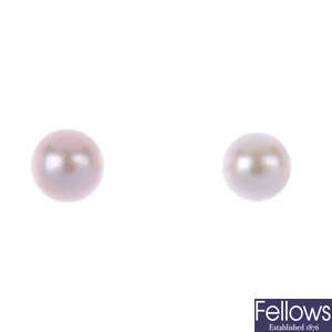 A pair of pink cultured pearl ear studs.