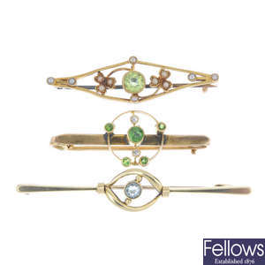A selection of three early 20th century gold gem-set bar brooches.