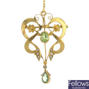 An early 20th century 9ct gold peridot, split pearl and paste pendant.