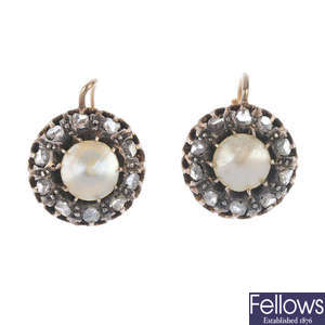 A pair of mother-of-pearl and diamond cluster earrings. 