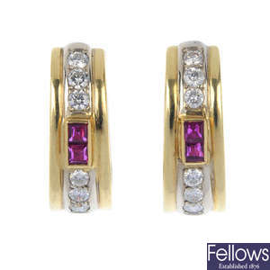 An 18ct gold ruby and diamond ear hoops.