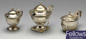 Two Victorian silver mustard pots & a later example.(3).