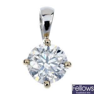 An 18ct gold brilliant-cut diamond single-stone pendant. 