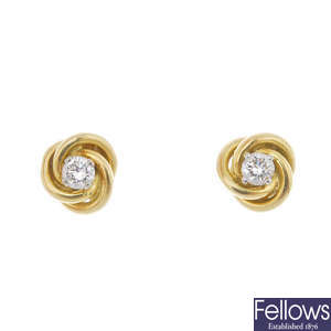 A pair of 18ct gold diamond ear studs.