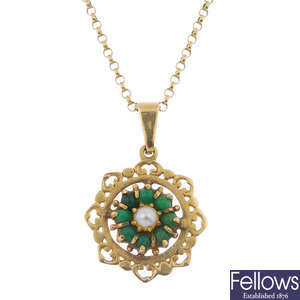 A selection of three 9ct gold gem-set pendants.