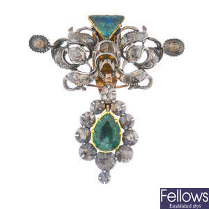 A late 19th century silver and gold emerald and diamond brooch.