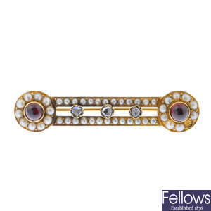 A late 19th century gold garnet split pearl and diamond brooch.