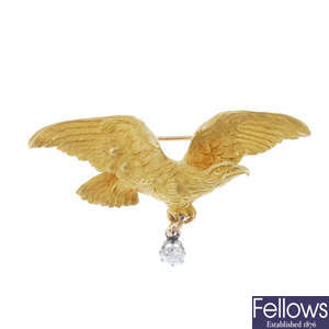 A diamond eagle brooch.