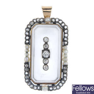 An Art Deco gold diamond, rock crystal and seed pearl pendant. 
