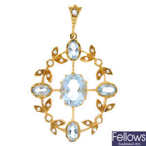 A 9ct gold aquamarine and seed pearl floral pendant.