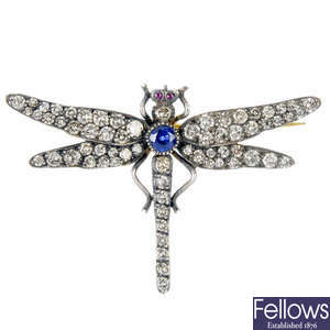 A diamond and gem-set dragonfly brooch.