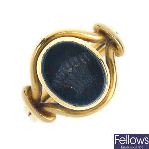 A late 19th century gold bloodstone intaglio ring.