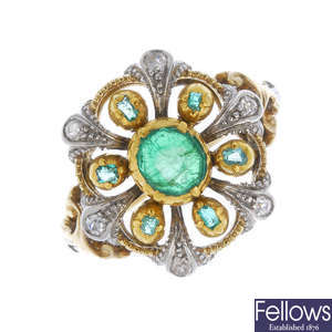 A bi-colour emerald and diamond dress ring.